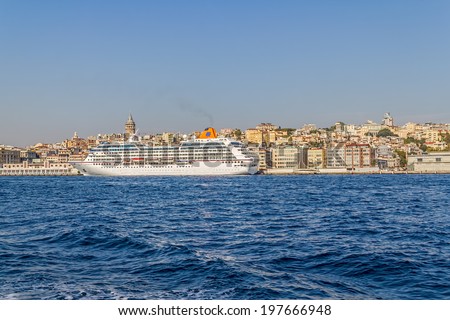 ISTANBUL, TURKEY - SEPTEMBER 29, 2013: Big cruise ship Columbus 2 anchored in the Orakoy district.