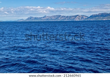 Brac sea channel between island and coast near mountain Biokovo.