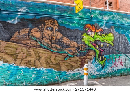 MELBOURNE, AUSTRALIA - MARCH 16, 2015: Colorful graffiti in back alley of downtown.