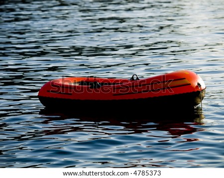 inflatable boat for fun at sunset