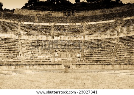 Roman amphitheater in Amman, Al-Qasr site, Jordan. Sepia and digital effect added.