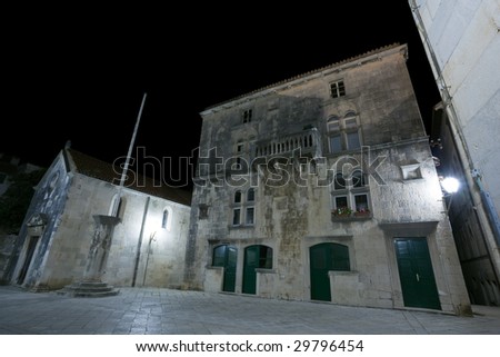 Main square in old medieval town Korcula  by night. Croatia, Europe.