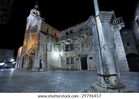Main square with cathedral in old medieval town Korcula  by night. Croatia, Europe.