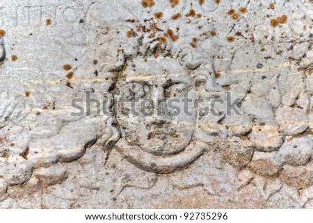 Roman sarcophagus relief detail with men head in Ephesus (Efes) from Roman time in Turkey.