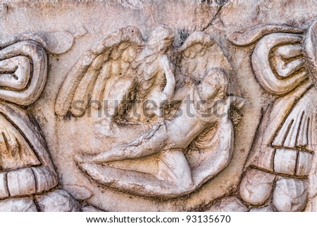 Building relief detail with human figures in Aphrodisias (Turkey).