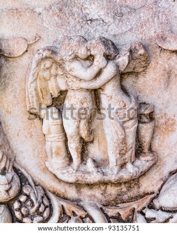 Building relief detail with human figures (angels) in Aphrodisias (Turkey).