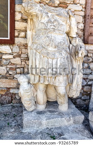 Remains of the stone sculpture of the Roman soldier without head in Aphrodisias (Turkey) build during Hellenistic and Roman period. In Roman time it was a small city in Caria.
