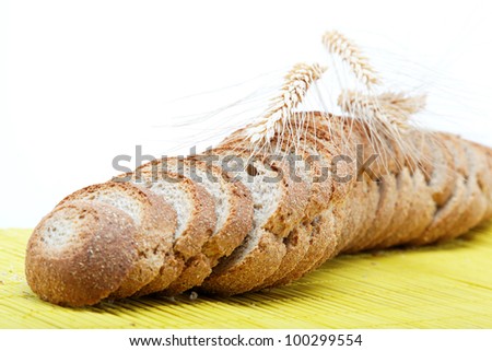 Fresh bread on a bamboo napkin.