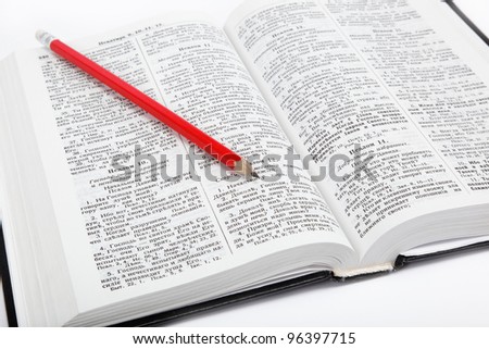 open book / Holy Bible and pencil on white background.