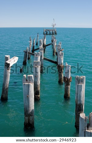 sea birds on the broken end of the long jetty at port germein, south australia