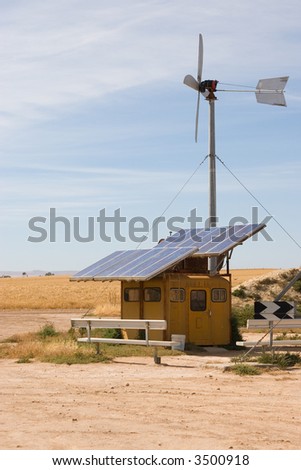 homemade wind and solar energy sources at an alternative energy farm using recycled materials