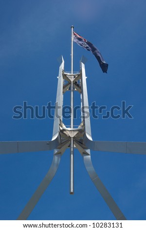 the iconic australian flag on top of parliament house canberra