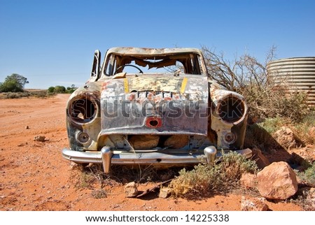 stock photo old rusty car in the desert