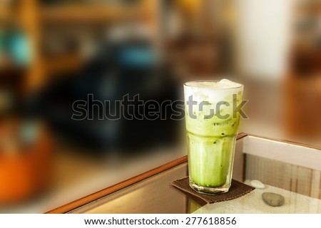Ice Green tea on table in coffee shop classic style