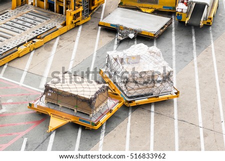 Cargo on vehicle wait for transport to airplane at airport