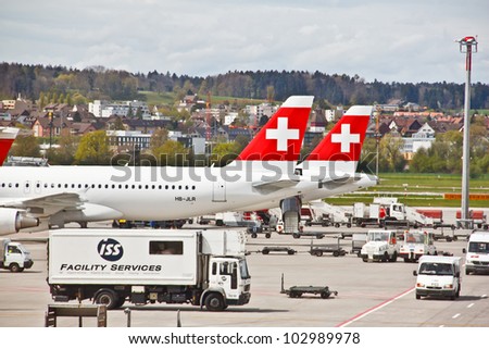 ZURICH - APRIL 22: SWISS's commercial air crafts at Zurich airport on April 22, 2012 in Zurich, Switzerland. Swiss International Air Lines (SWISS) was formed  after the 2002 bankruptcy of Swissair.