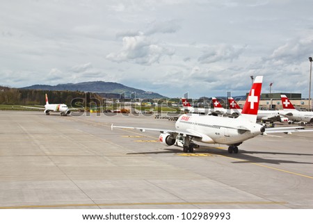 ZURICH - APRIL 22: SWISS\'s commercial air crafts at Zurich airport on April 22, 2012 in Zurich, Switzerland. Swiss International Air Lines (SWISS) was formed  after the 2002 bankruptcy of Swissair.