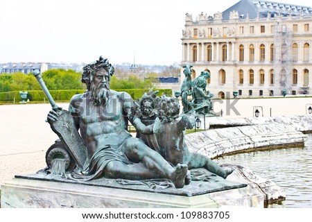 bronze sculpture in the garden of versailles palace, Paris, France