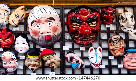 TOKYO-APRIL 7: Funny Japanese masks at the shop near Sensoji temple Tokyo, Japan on Apr 7th, 2013. Sensoji temple is the oldest Buddhist temple and the most famous tourist destination temple in Tokyo.