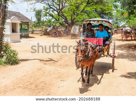 MANDALAY MAY24: tourists hire horse carriage for ancient city tour  in Ava, Mandalay on May 24, 2014 , The Ava Kingdom was the dominant kingdom that ruled upper Burma (Myanmar) from 1364 to 1555.