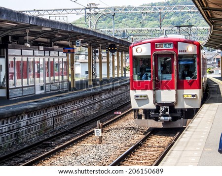 NARA -APR 19: Local train at a station on Apr 19, 2014 in Nara, Japan. Rail transport services in Japan are provided by more than 100 private companies