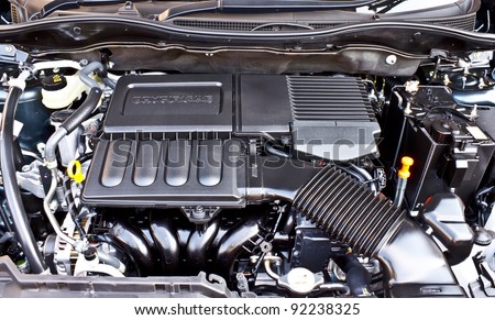 detail of sub compact car's gasoline engine