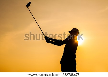 Silhouette of Golfer Drive Golf