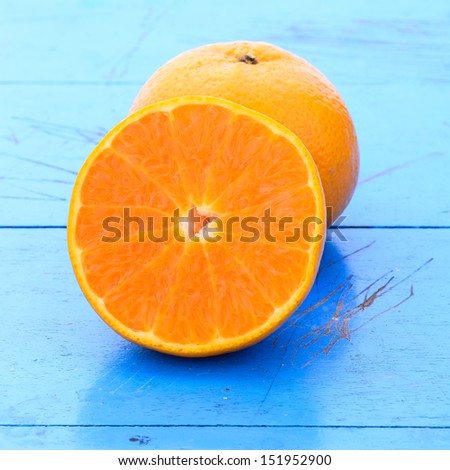 Orange on blue table