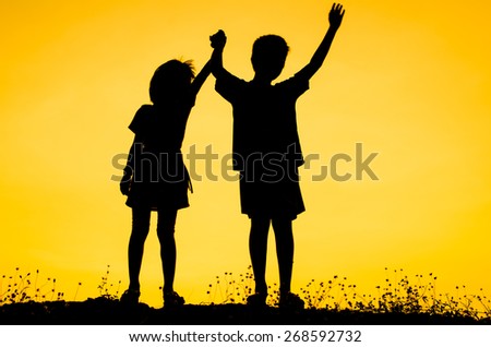 Little brother and sister silhouette
