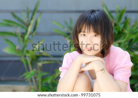 cute Asian teenager girl on portrait, head shot, pastel stle processed