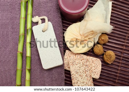 Spa and bath background with handmade soap, bamboo, bag of massage oil