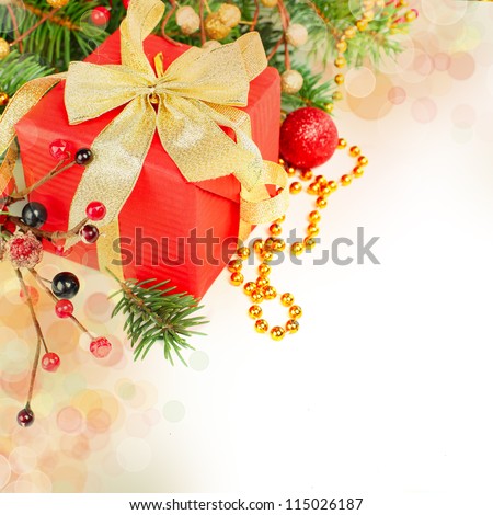 Christmas gift isolated - border with red holly, green fir and gold decor on white background