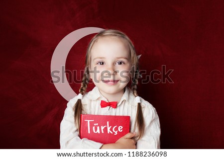 Turkish language concept. Cute child girl student on the Turkey flag background. Learn turkish language