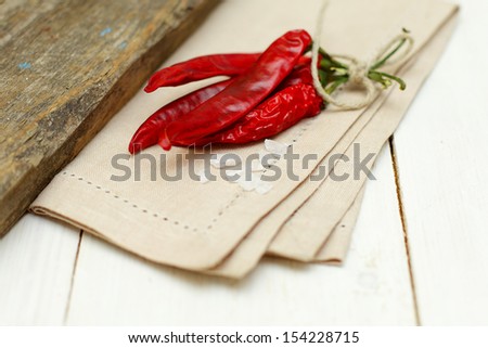 Vintage food background - salt and red pepper