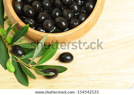 Olives with green leaves, background - food border