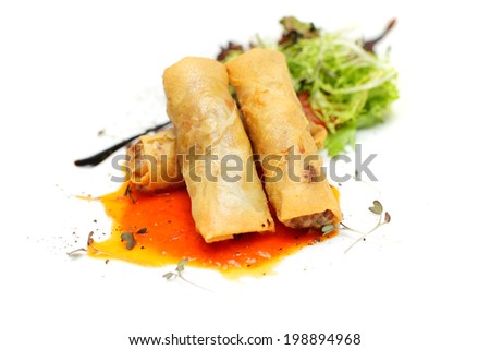 Stuffed cabbage rolls and mixed greens