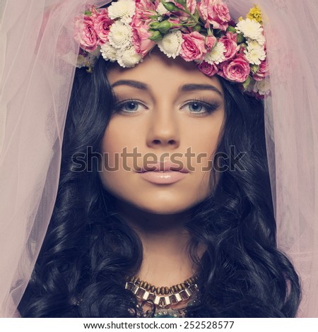 Spring fashion look woman wearing a wreath of roses