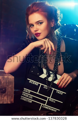 Young woman film director portrait.