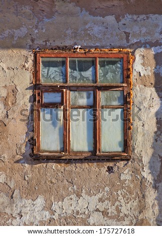Window in old deserted house.