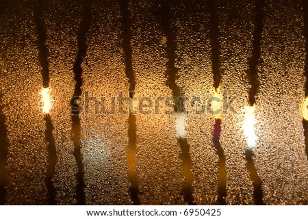 Misted window at night. Texture or background.