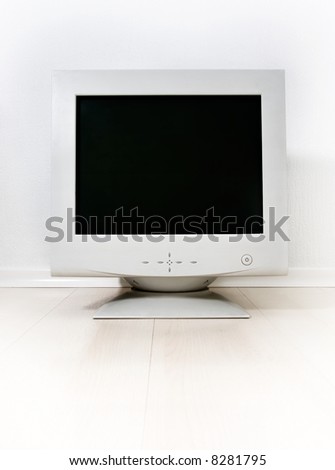 Computer CRT monitor on a bright background.