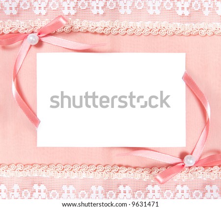 Post card with blank sheet of paper and two bows. Bright soft pink colors.