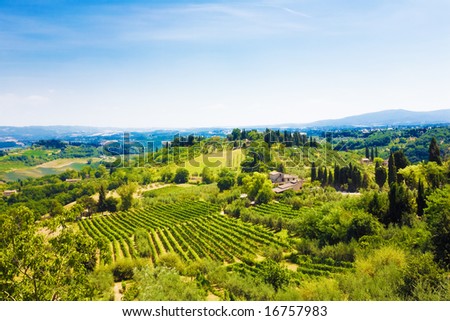 Traditional Toscana Italy landscape. Hills, fields and sky.