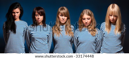 Five sad women team portrait.