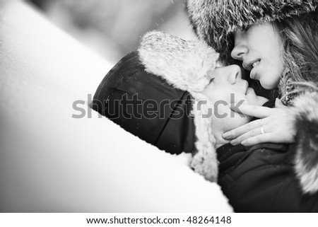 couple kissing images. couple kissing on snow.