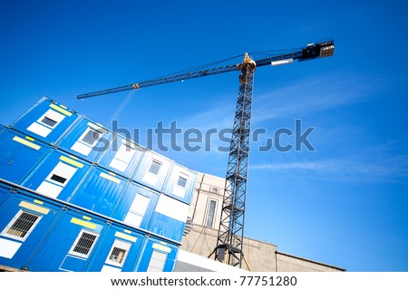 Lifting crane on building. Wide angle view.