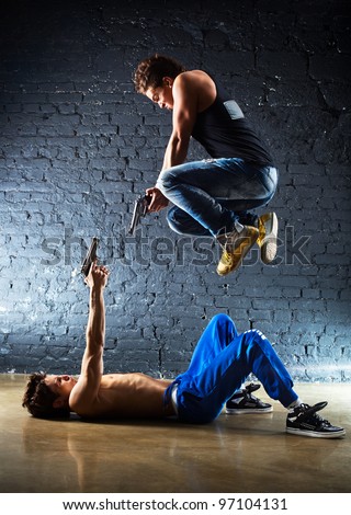 Men with guns fighting. Contrast colors.