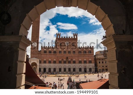 SIENA , ITALY - AUGUST 20: Piazza del Campo is the principal public space of the historic center of Siena, on August 20, 2013 in Siena, Italy