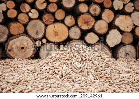Pine pellets in front a wall of fire woods