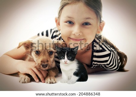 child and puppy and kitten